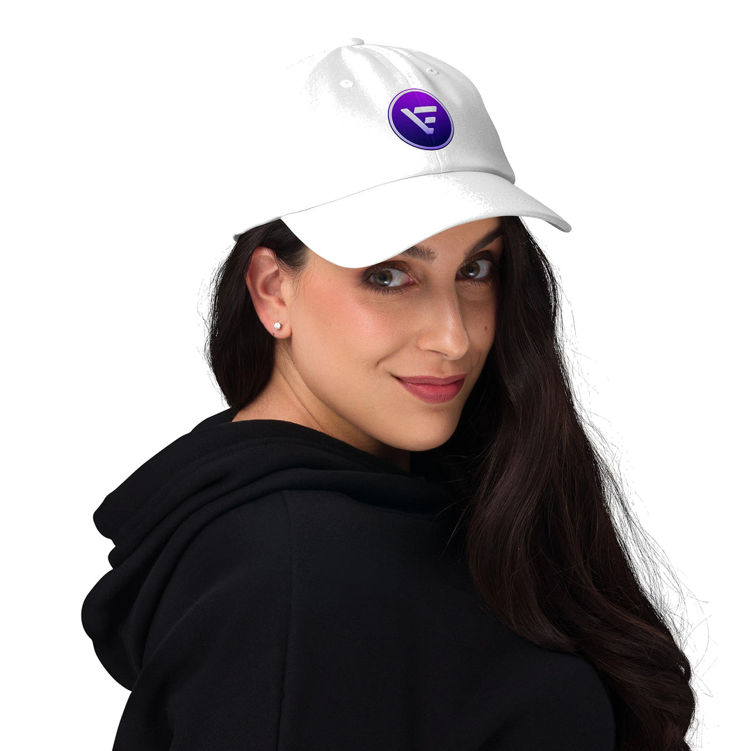 white velix dad hat with velix logo crypto streetwear cap worn by model