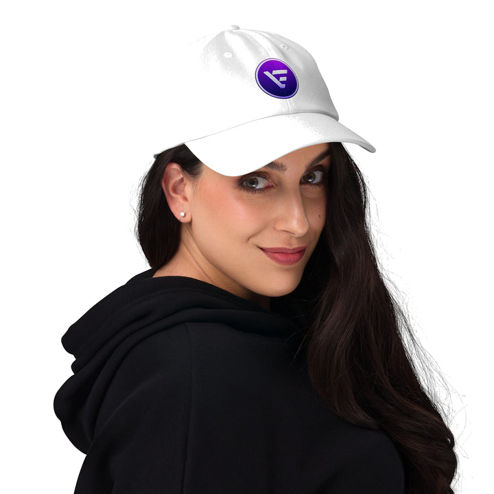 white velix dad hat with velix logo crypto streetwear cap worn by model